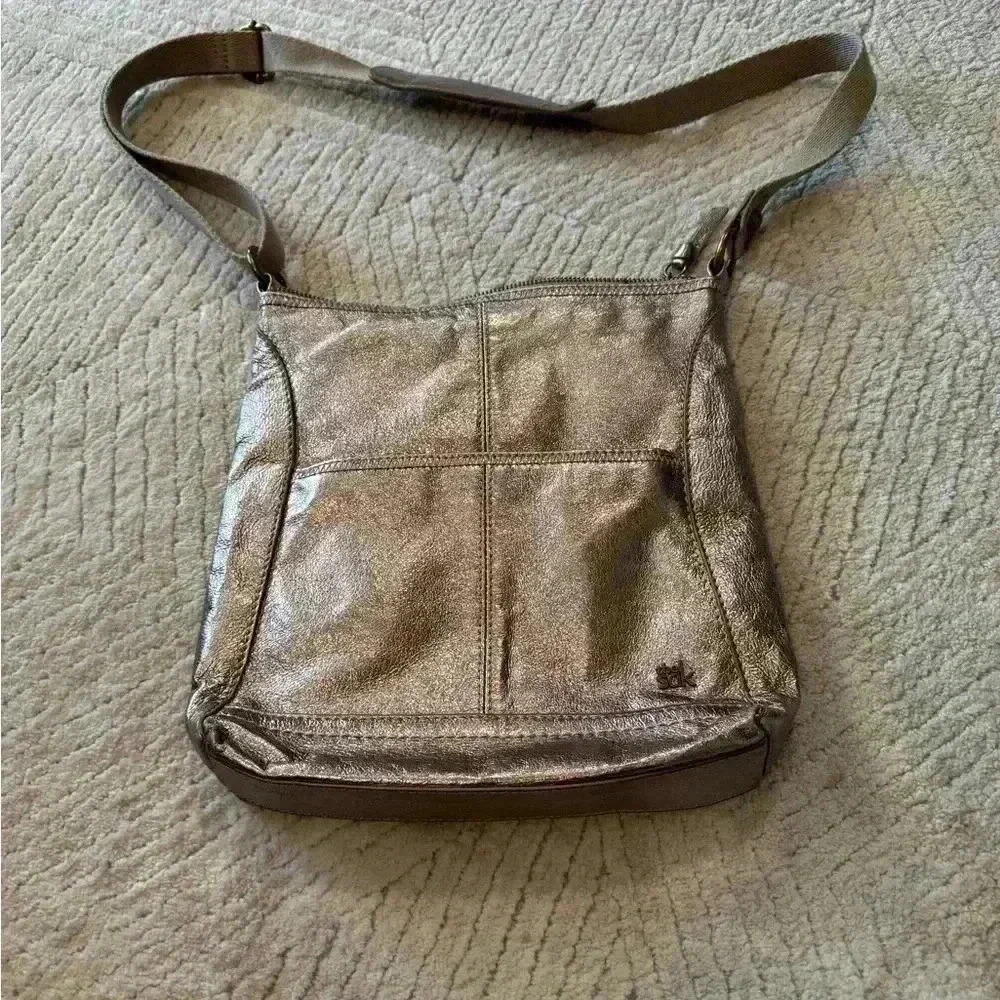 THE SAK crossbody purse.  Rose gold metallic color